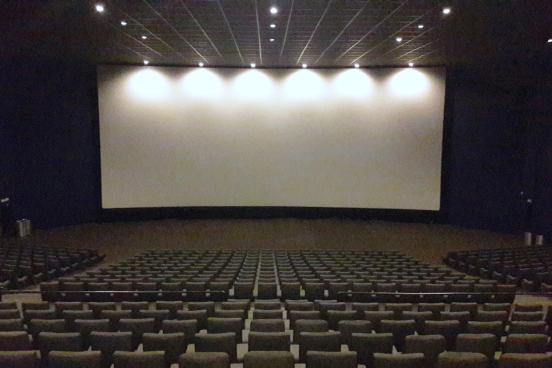 Movie theater with screen and chairs