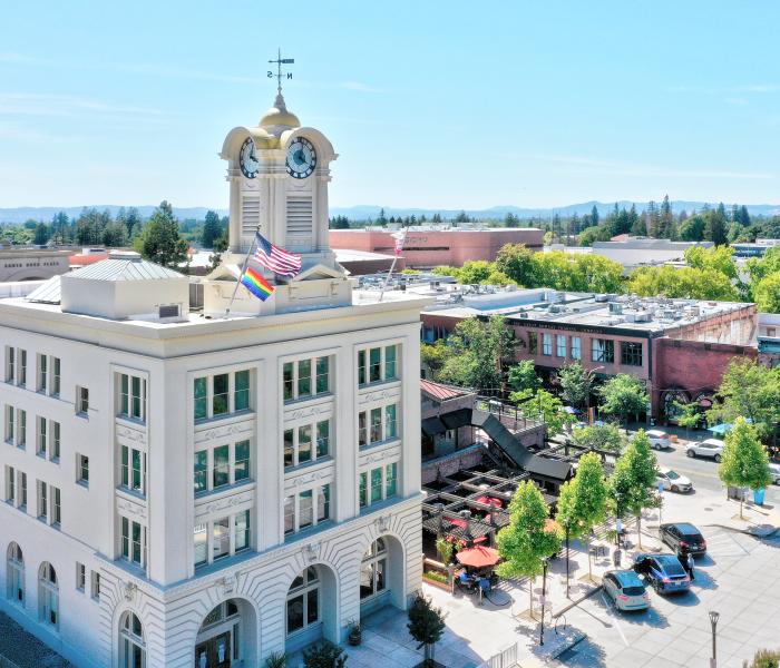 Hotel exterior building and aerial view of downtown Santa Rosa from afar