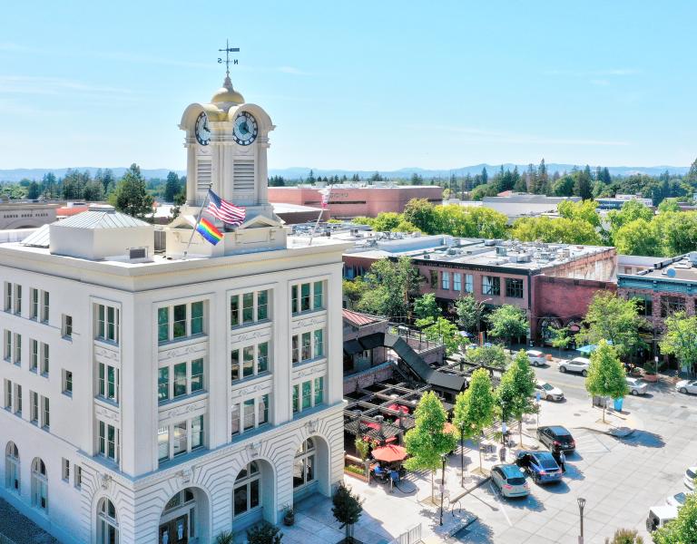 Hotel exterior building and aerial view of downtown Santa Rosa from afar